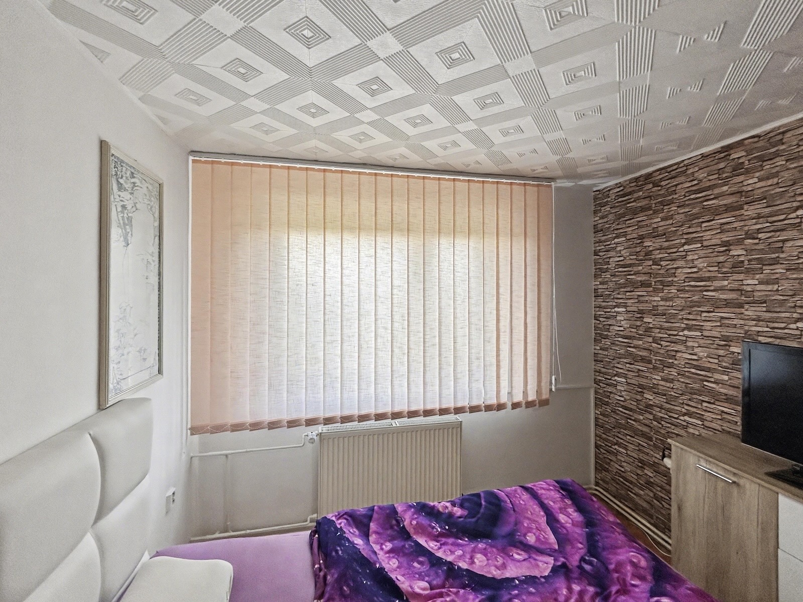 Vertikální žaluzie ložnice